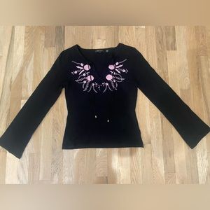 BCBG MAX AZRIA black sweater with embroidery.